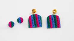 Multicolored earrings made by Faheema Chaudhury in her Make Faux Knit Dangle Earrings with Polymer Clay class on Creativebug.